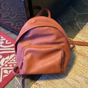 Burnt orange backpack purse